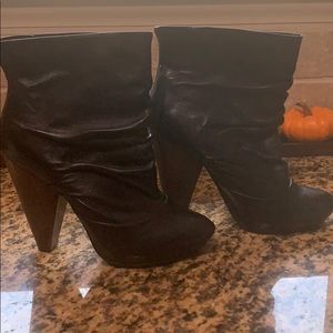 Very Volatile Black Booties